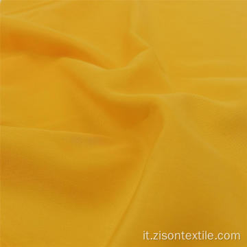 Tessuto per camicie in pelle di pesca lavabile tinta unita popolare